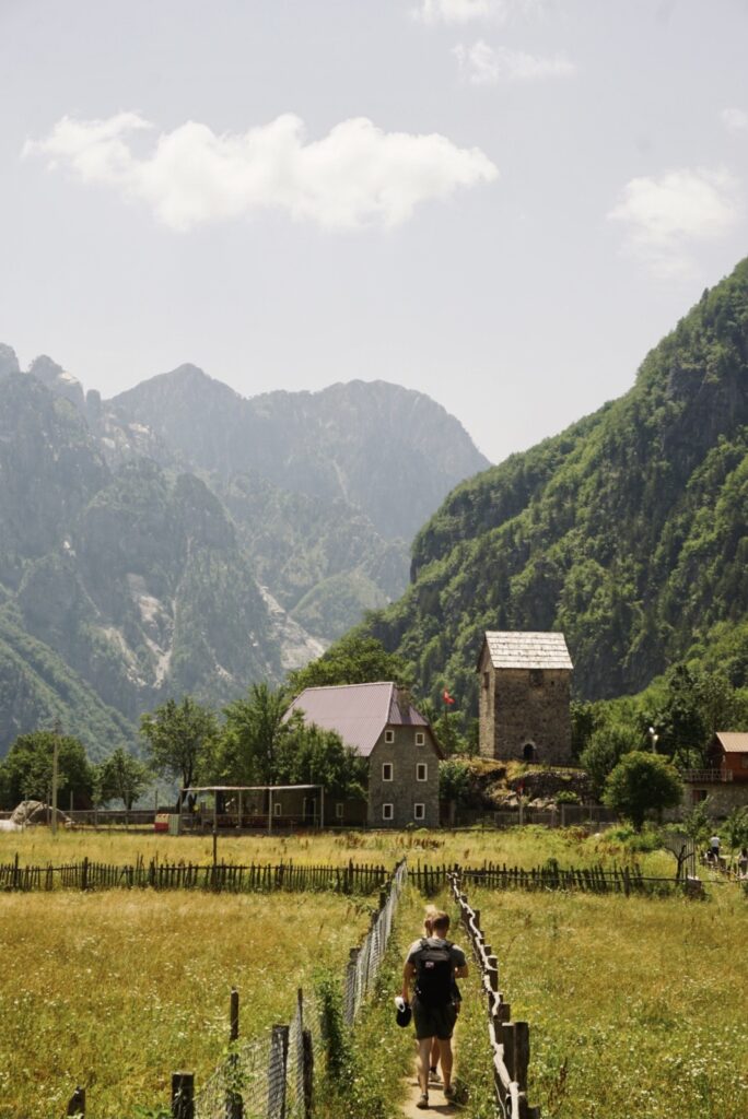 a house infront of mountains